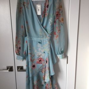 Yumi Kim wrap dress midi length, light blue floral pattern, size medium